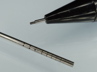 Visual representation of test cut stainless-steel tube Visual representation of test cut stainless-steel tube