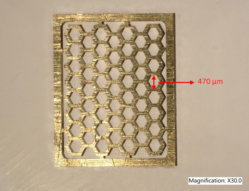 Test cut of a brass honeycomb shape